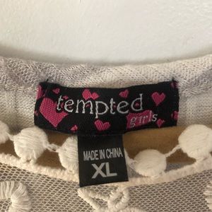 the brand is tempted the colors are white and grey off the shoulders